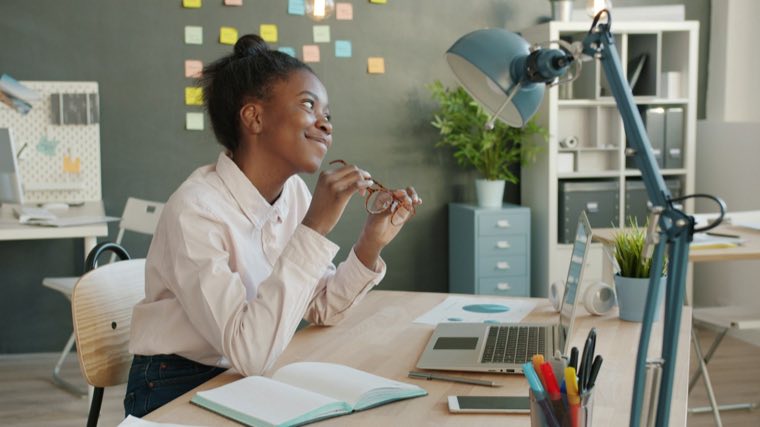 Student at work in a bright office