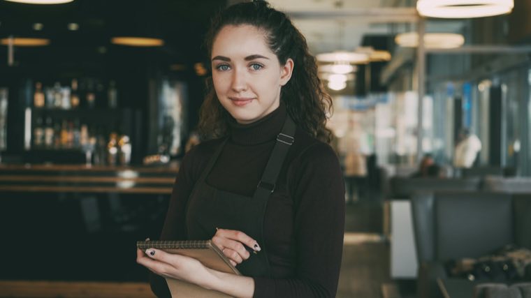 Young woman at work in a cafe