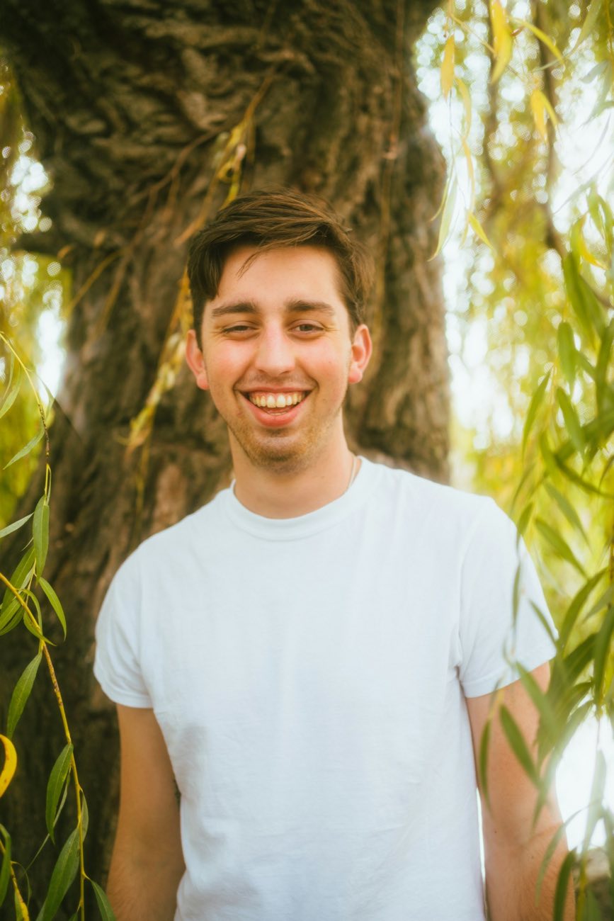 Smiling young man outdoors