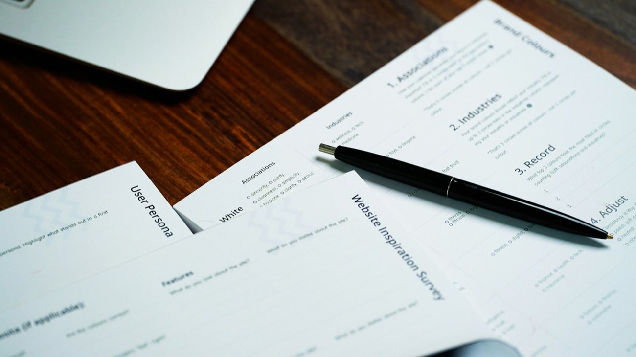 Paper form with a pen