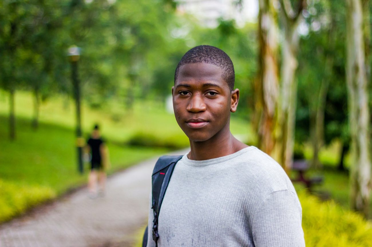 Young man smiling outdoors