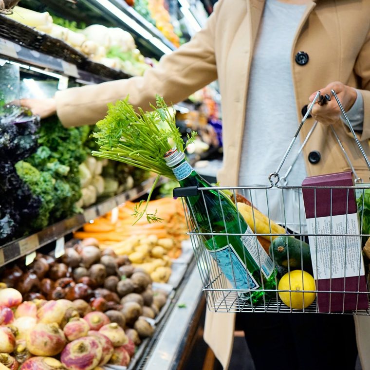 A basket of vegetables in a grocery store
